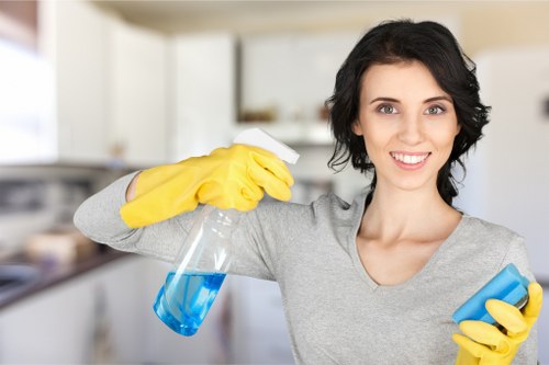 Professional cleaners focusing on hidden dirt during a Greenwich deep clean