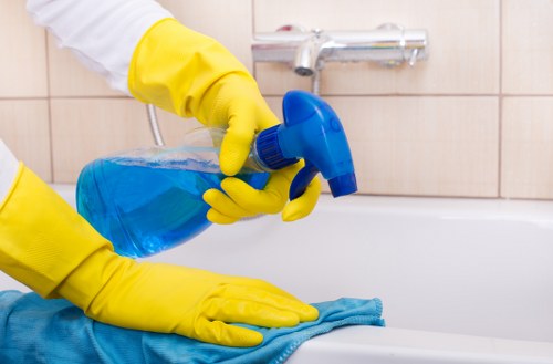 Greenwich deep cleaning kitchen surfaces and appliances being thoroughly cleaned